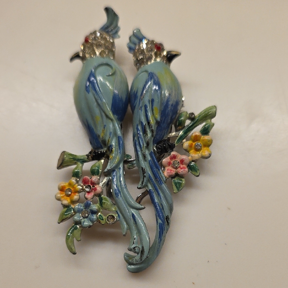 Charming Blue Bird Brooch with Floral Accents